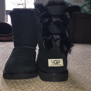 Short black UGG boots.